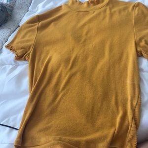 Yellow turtle neck